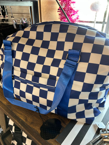 Bag: Blue checkered travel bag